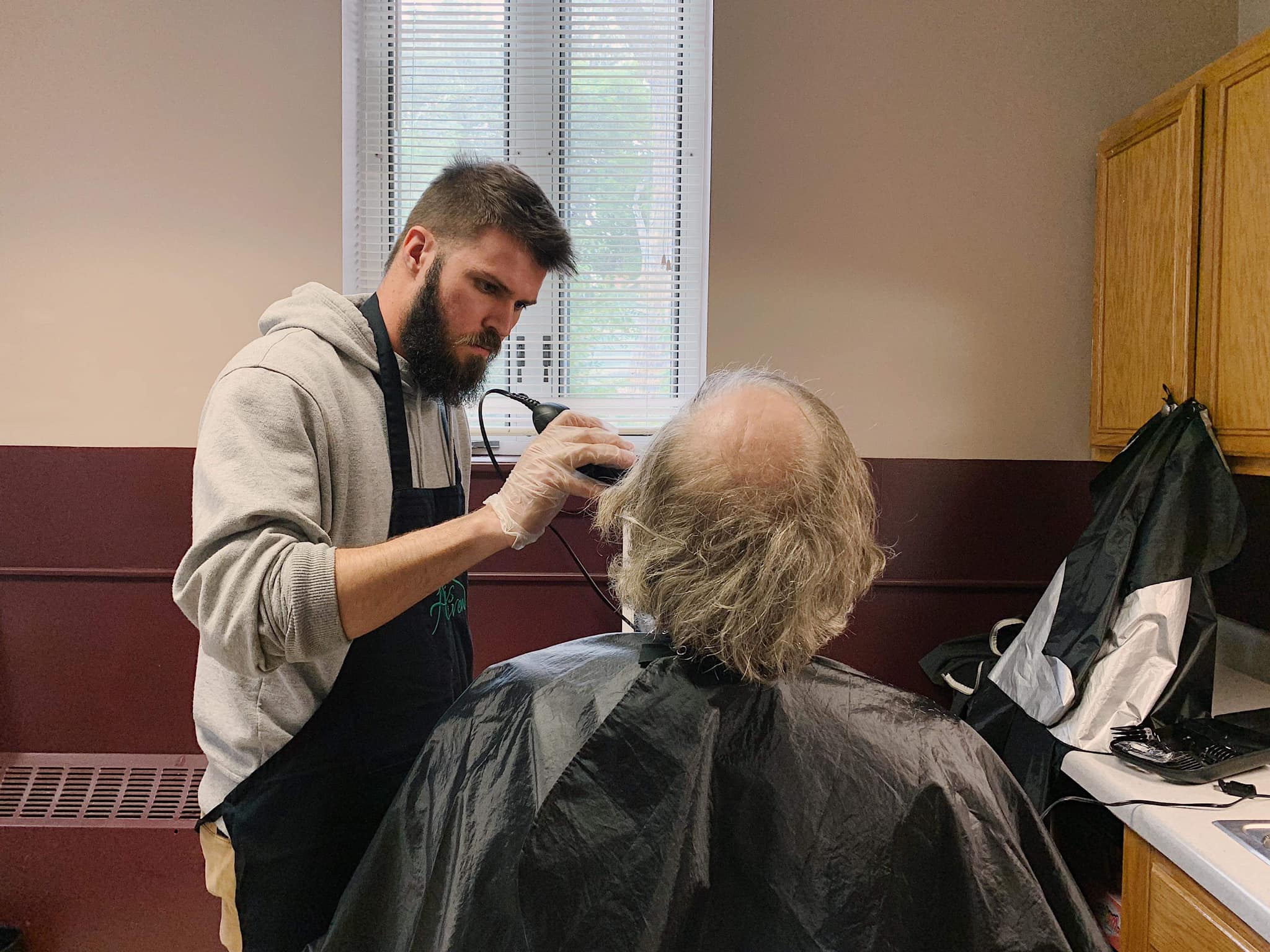 Men enjoying the Steak and Shave community event at His Haven in Elmira NY